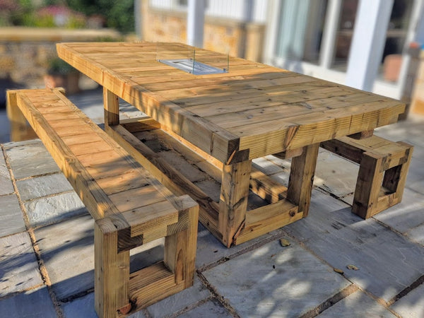 8ft x 4ft Solid wood dining table with matching benches and central firepit