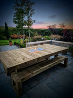 8ft x 4ft Solid wood dining table with matching benches and central firepit
